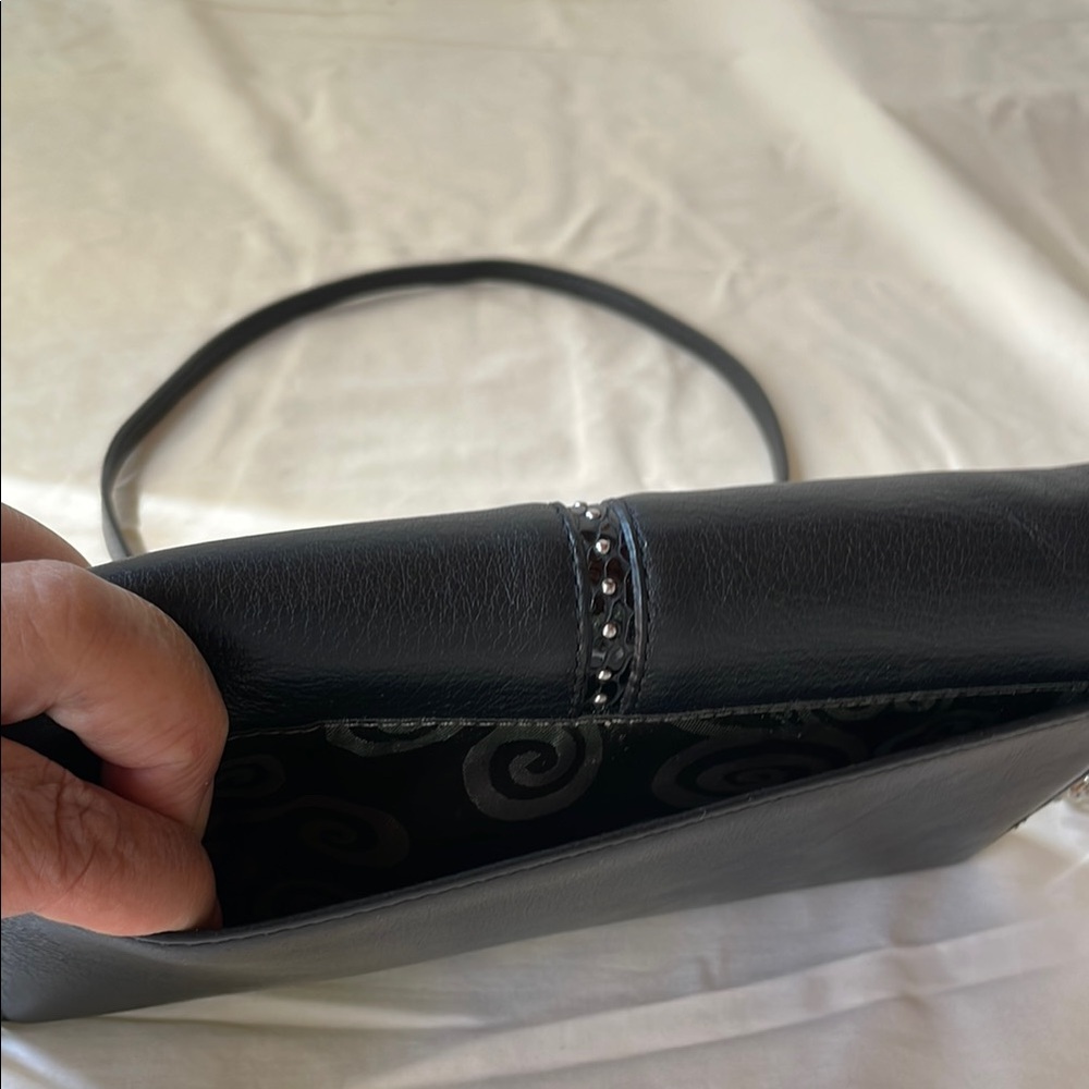 Brighton Black Crossbody Bag with Sleek Leather and Metallic Accents - Picture 10 of 11